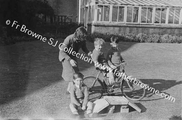 JOHN MALLICK PLAYING WITH HIS COUSINS O'NEILL & MRS O'NEILL AT MALLICKS ON CURRAGH